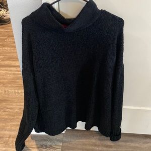 Black loose fitting turtleneck sweater